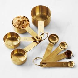 Williams Sonoma Gold Measuring Cups Set of 8 - image 1