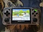 Anbernic RG35XX H Transparent White + 64GB Card Knulli, charger - image 1