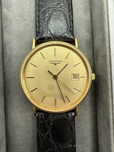 Longines L4.636.2 Men's Quartz Wristwatch Round Gold Dial Date Swiss Made 35mm - image 1