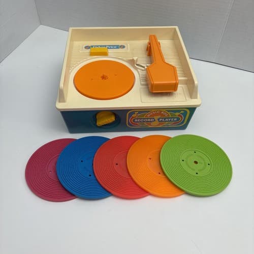 Vintage Fisher-Price Music Box Record Player with 5 Double-Sided Colorful CDs - image 1