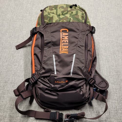 CamelBak M.U.L.E. 12 Hydration Pack 3L Reservoir Camo 100oz Zip Hiking Biking - image 1