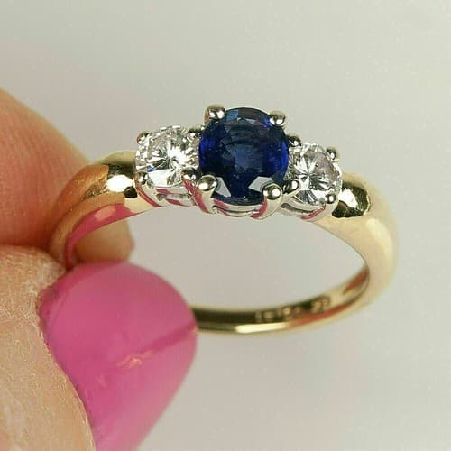 2.5 Ct Lab-Created Oval Blue Sapphire and Cubic Zirconia Three-Stone Engagement Ring 14K Yellow Gold Plated Sterling Silver - image 1